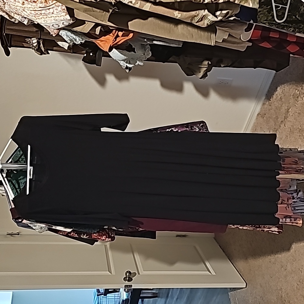 Black shin length dress